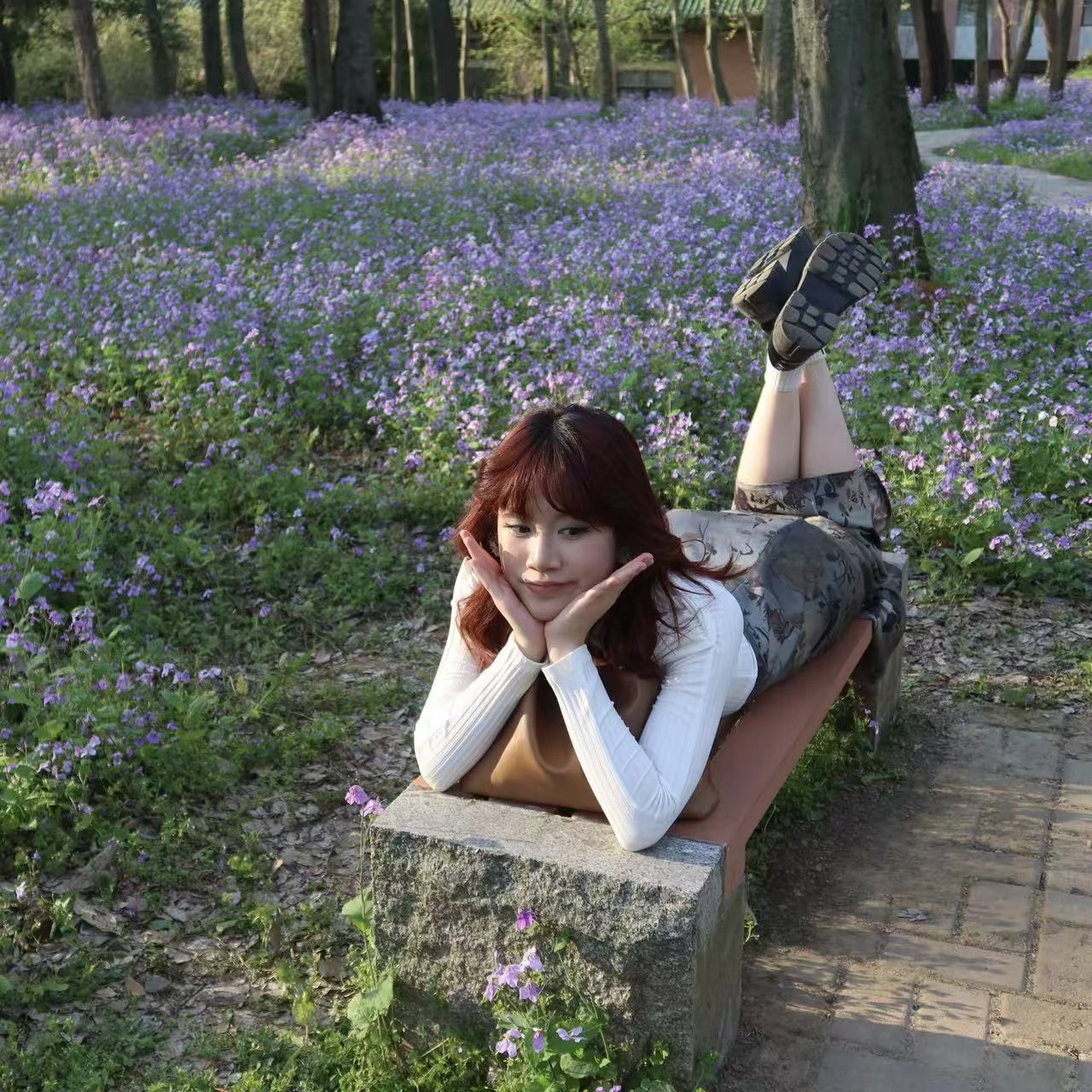 Peggy Wong among woodland flowers
